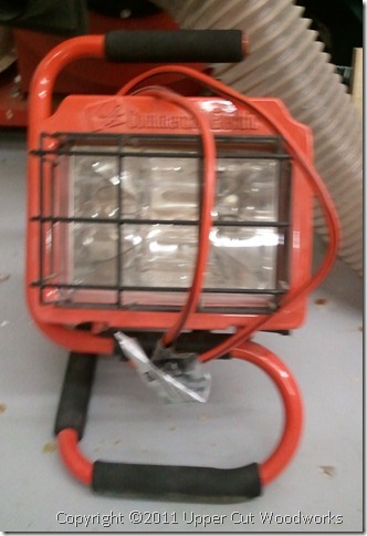 Halogen lamp, great as a raking light for finishing. $10.